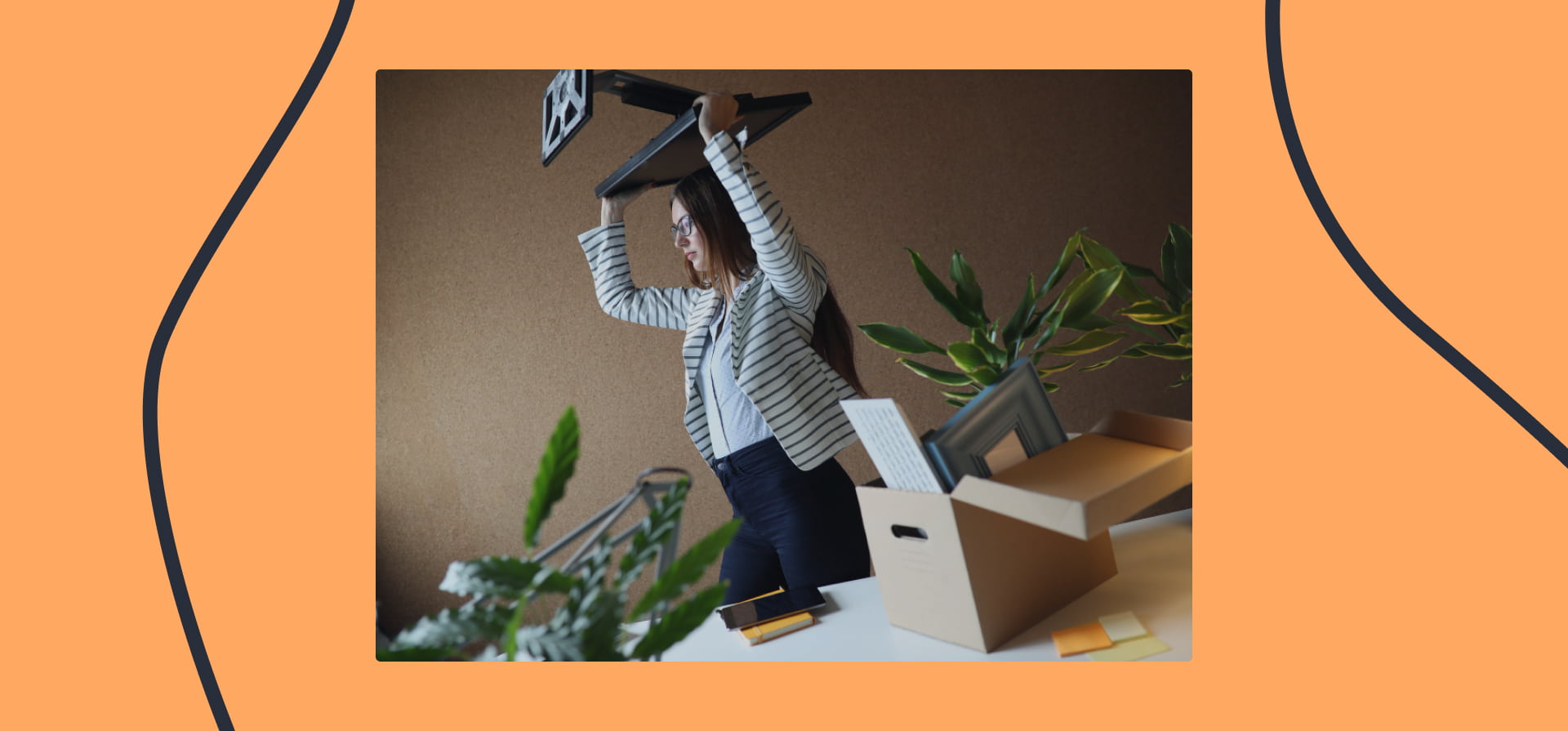 A woman grudgingly carries a monitor as she prepares to move in