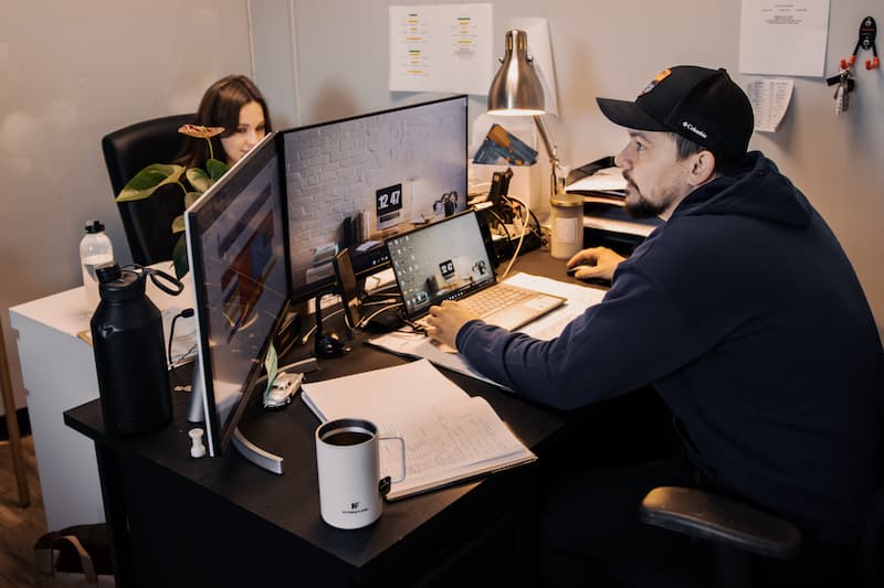 Move and Care office staff planning moves at their desks