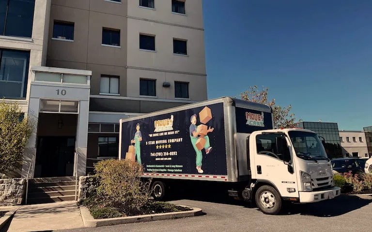 Move and Care truck outside an apartment building